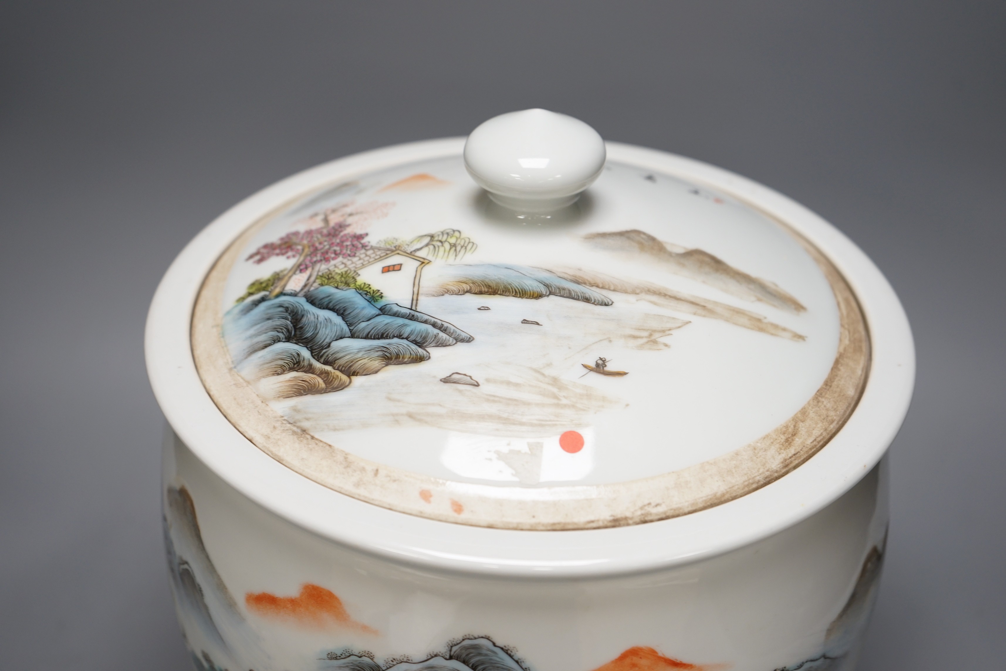 A large Chinese famille rose bowl and cover with mountainous landscape, 34cm tall